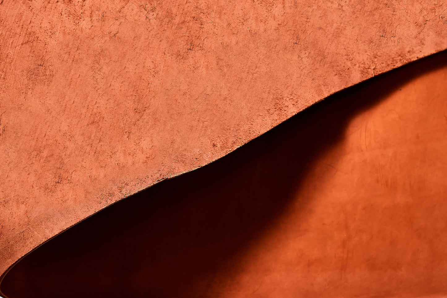 Chestnut leather rolled skirting side hide