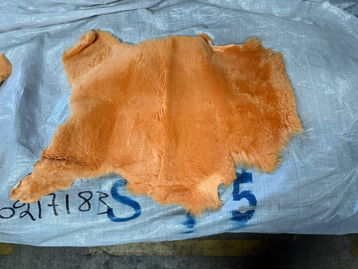 Orange chrome tanned sheepskin, wool side